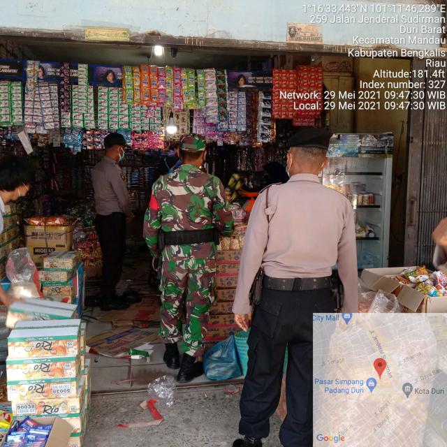 TNI Koramil 04/Mandau Himbau Masyarakat Patuh Prokes C-19
