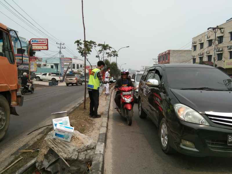 Peduli Kepada Korban Kabut Asap, PPAI Bersama RPAI dan Gojek Bagi-Bagi Masker