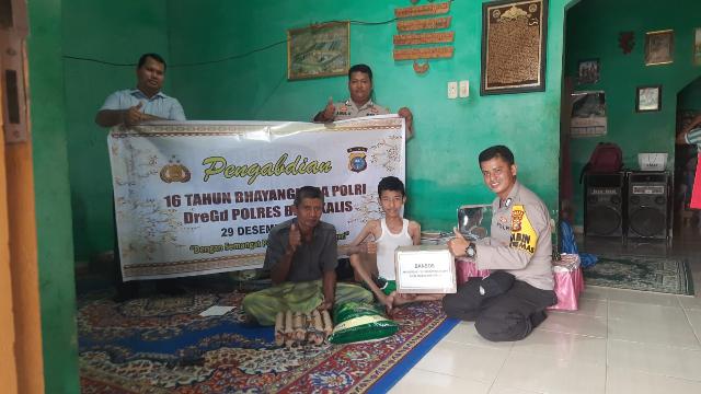 Rangka HUT ke 16, Angkatan 29/DREGD Polres Bengkalis Bansos Untuk Warga Kurang Mampu