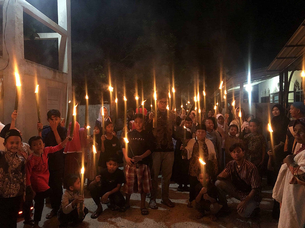 MEMPERINGATI 10 MUHARRAM 1444 H, KKN DESA RANAH BARU GELAR LOMBA, PAWAI OBOR & TABLIGH AKBAR