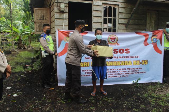 HUT Bhayangkara ke 75, Polres Bengkalis Gelar Jum'at Barokah Untuk Warga Terdampak C-19