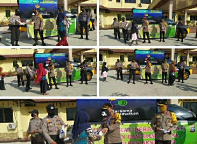 Jajaran Polres Bengkalis Berikan Bantuan ke Masyarakat Terdampak Covid-19