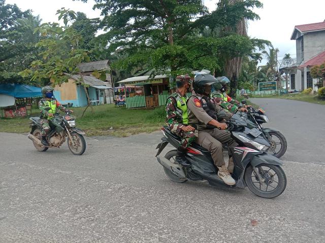 Serda Robbi Bersama Satpol PP Mandau Patroli Jelang Pemilukada Bengkalis di Babussalam