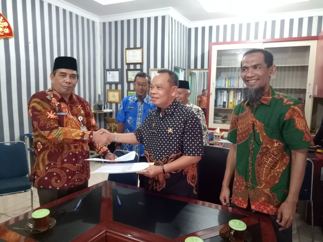 Disprindag Rohul lakukan kunjungan dengan disprindag Rohil