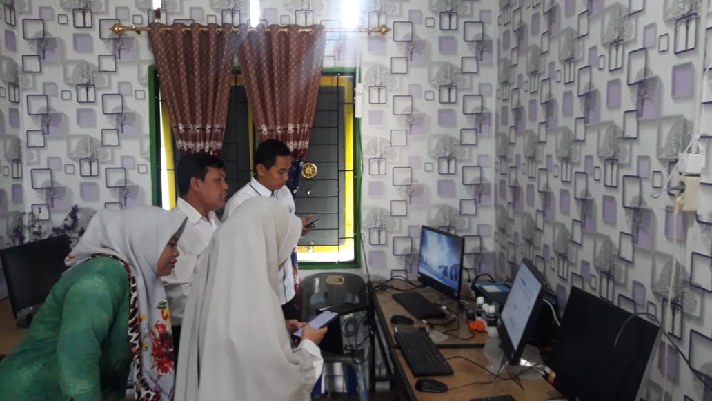 Dinas Perpustakaan dan Kearsipan Labuhanbatu Kunjungan Ke Perpustakaan Desa Tebing Linggahara