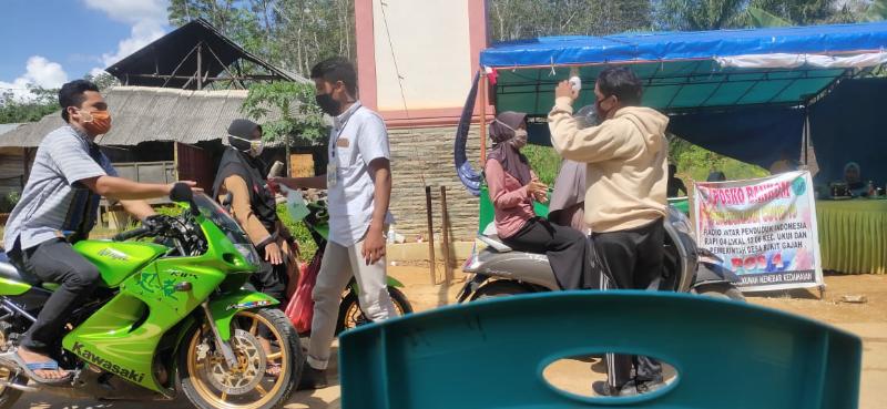 Relawan  COVID-19 UNRI Beserta PEMDES Bukit Gajah Gelar  Penjagaan Pos Masuk Desa