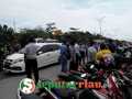 Jalan HR. Soebrantas Tergenang Air, Parkir Liar Menambah Kemacetan