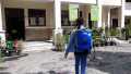 Tim Pengabdian UNRI Gelar Penyemprotan Disinfektan di Lingkungan Sekolah Kel. Tangkerang Utara 